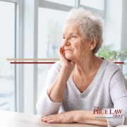 elder woman looking out the window
