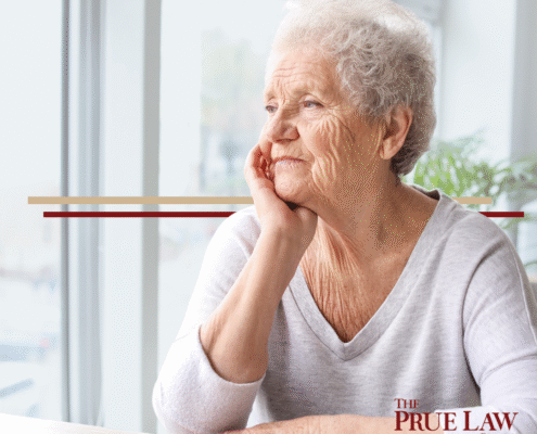 elder woman looking out the window